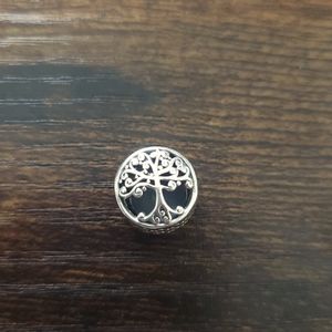 Authentic Pandora Openwork Family Roots Charm.